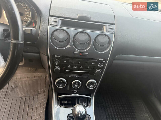 Синий Мазда 6, объемом двигателя 1.8 л и пробегом 355 тыс. км за 4500 $, фото 7 на Automoto.ua