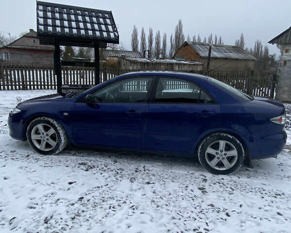 Синий Мазда 6, объемом двигателя 2 л и пробегом 288 тыс. км за 3850 $, фото 6 на Automoto.ua