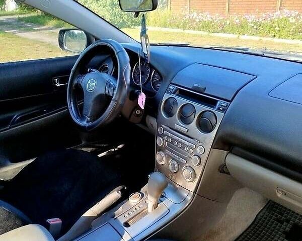 Синій Мазда 6, об'ємом двигуна 2 л та пробігом 295 тис. км за 4500 $, фото 4 на Automoto.ua