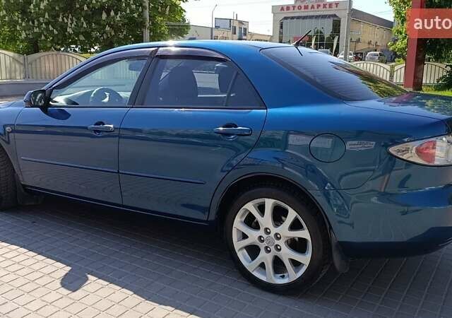 Синий Мазда 6, объемом двигателя 1.8 л и пробегом 170 тыс. км за 5500 $, фото 8 на Automoto.ua