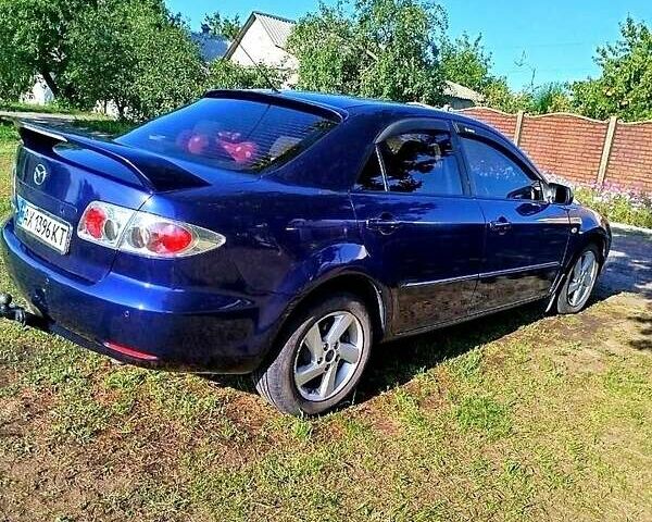 Синій Мазда 6, об'ємом двигуна 2 л та пробігом 295 тис. км за 4500 $, фото 5 на Automoto.ua