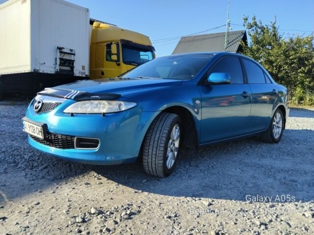 Синий Мазда 6, объемом двигателя 2 л и пробегом 385 тыс. км за 4500 $, фото 2 на Automoto.ua