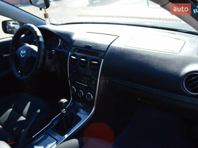 Синий Мазда 6, объемом двигателя 1.8 л и пробегом 170 тыс. км за 5300 $, фото 18 на Automoto.ua
