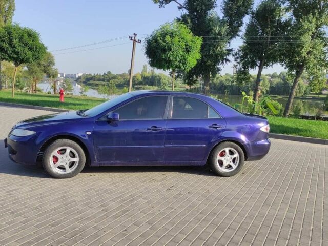 Синий Мазда 6, объемом двигателя 2 л и пробегом 220 тыс. км за 3200 $, фото 1 на Automoto.ua