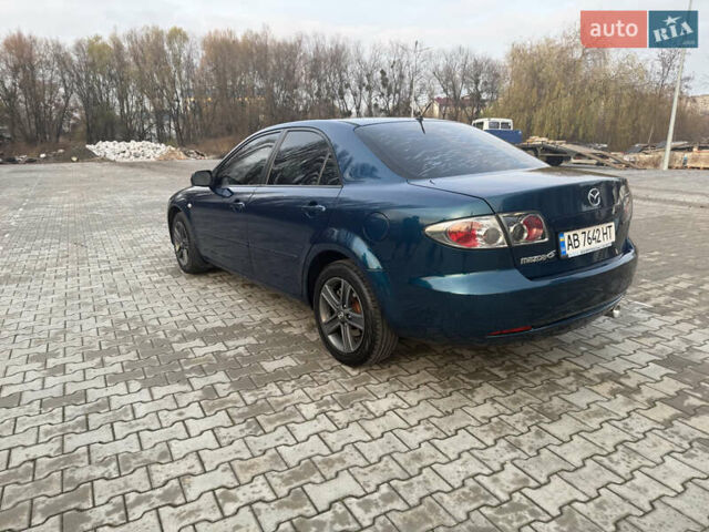 Синий Мазда 6, объемом двигателя 1.8 л и пробегом 355 тыс. км за 4500 $, фото 2 на Automoto.ua