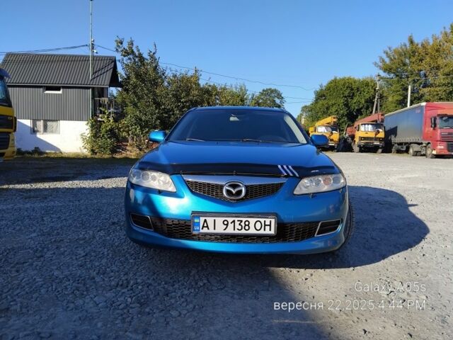 Синий Мазда 6, объемом двигателя 2 л и пробегом 385 тыс. км за 4500 $, фото 1 на Automoto.ua