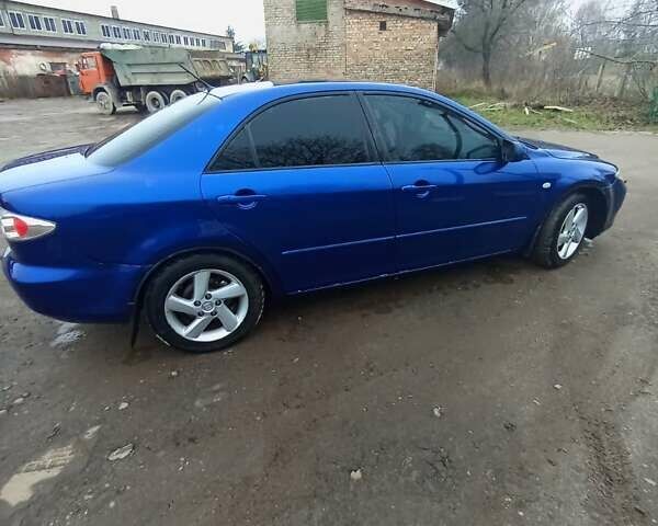 Синій Мазда 6, об'ємом двигуна 2 л та пробігом 380 тис. км за 3900 $, фото 4 на Automoto.ua