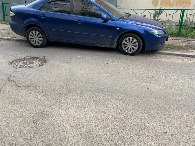 Синий Мазда 6, объемом двигателя 2 л и пробегом 300 тыс. км за 3500 $, фото 4 на Automoto.ua