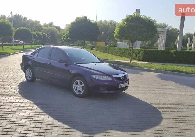 Синий Мазда 6, объемом двигателя 2 л и пробегом 220 тыс. км за 3200 $, фото 2 на Automoto.ua
