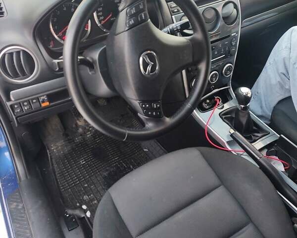 Синий Мазда 6, объемом двигателя 1.8 л и пробегом 268 тыс. км за 4324 $, фото 7 на Automoto.ua