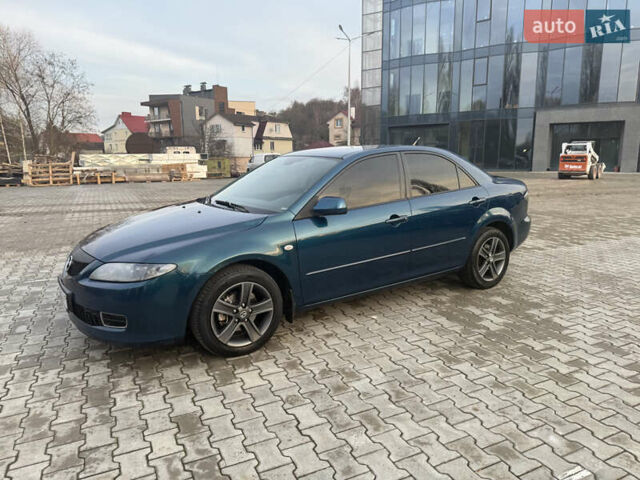 Синий Мазда 6, объемом двигателя 1.8 л и пробегом 355 тыс. км за 4500 $, фото 1 на Automoto.ua