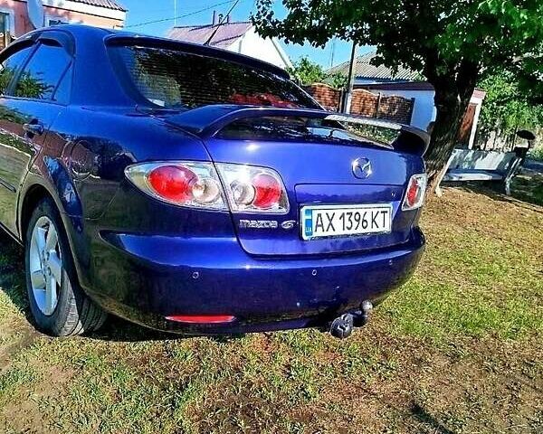 Синій Мазда 6, об'ємом двигуна 2 л та пробігом 295 тис. км за 4500 $, фото 3 на Automoto.ua