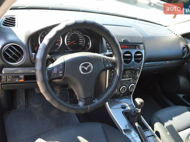 Синий Мазда 6, объемом двигателя 1.8 л и пробегом 170 тыс. км за 5300 $, фото 6 на Automoto.ua