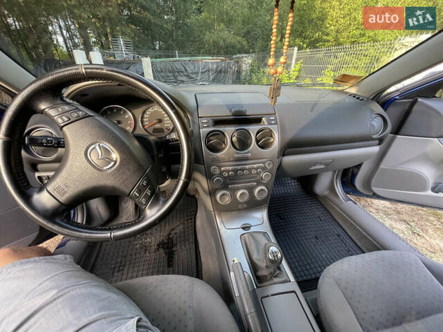 Синий Мазда 6, объемом двигателя 1.8 л и пробегом 170 тыс. км за 5000 $, фото 2 на Automoto.ua