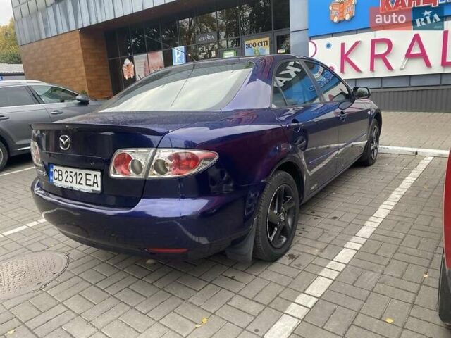 Синий Мазда 6, объемом двигателя 1.8 л и пробегом 230 тыс. км за 4000 $, фото 2 на Automoto.ua
