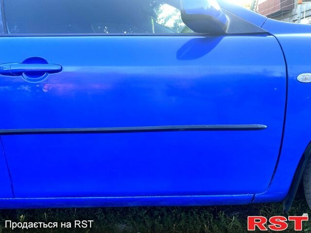 Синий Мазда 6, объемом двигателя 2.3 л и пробегом 259 тыс. км за 4810 $, фото 3 на Automoto.ua