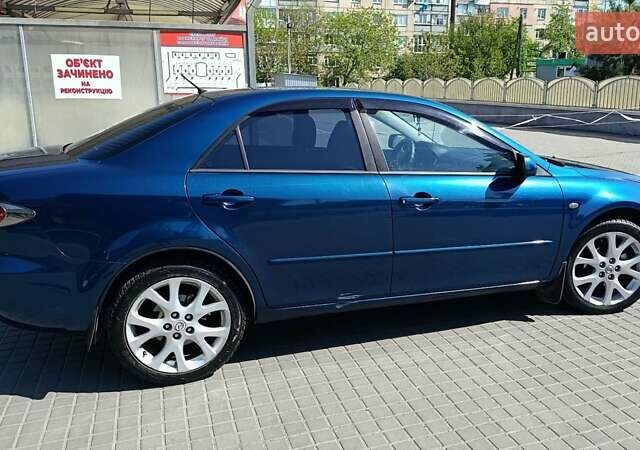 Синий Мазда 6, объемом двигателя 1.8 л и пробегом 170 тыс. км за 5500 $, фото 12 на Automoto.ua