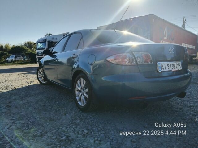 Синий Мазда 6, объемом двигателя 2 л и пробегом 385 тыс. км за 4500 $, фото 6 на Automoto.ua