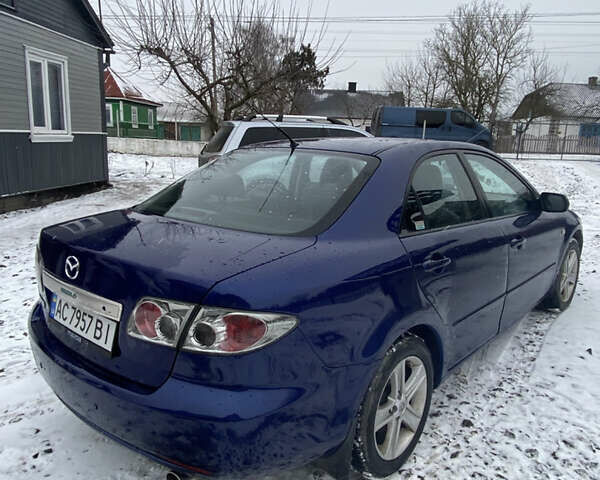Синий Мазда 6, объемом двигателя 2 л и пробегом 288 тыс. км за 3850 $, фото 2 на Automoto.ua