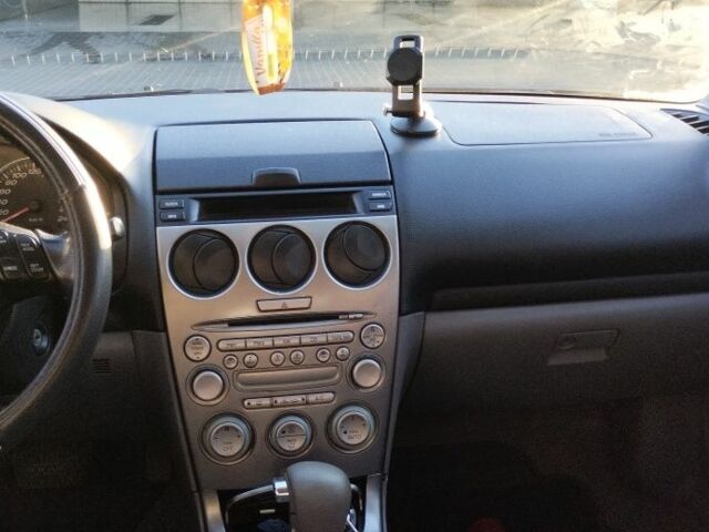 Синий Мазда 6, объемом двигателя 2 л и пробегом 300 тыс. км за 3500 $, фото 5 на Automoto.ua