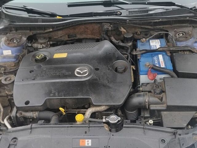Синий Мазда 6, объемом двигателя 2 л и пробегом 344 тыс. км за 4700 $, фото 5 на Automoto.ua