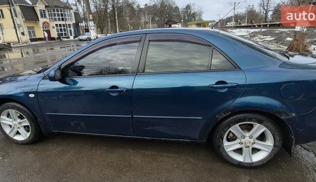 Синій Мазда 6, об'ємом двигуна 2 л та пробігом 329 тис. км за 3700 $, фото 3 на Automoto.ua
