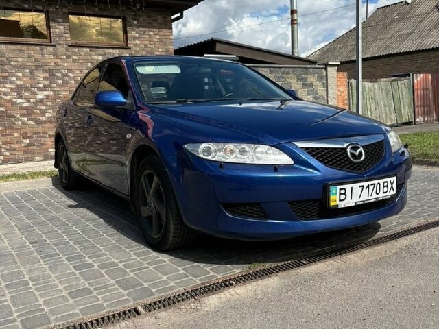 Синий Мазда 6, объемом двигателя 2 л и пробегом 185 тыс. км за 2999 $, фото 2 на Automoto.ua