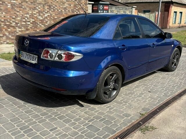 Синий Мазда 6, объемом двигателя 2 л и пробегом 185 тыс. км за 2999 $, фото 5 на Automoto.ua
