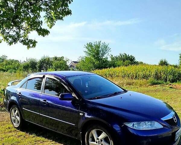 Синій Мазда 6, об'ємом двигуна 2 л та пробігом 295 тис. км за 4500 $, фото 2 на Automoto.ua