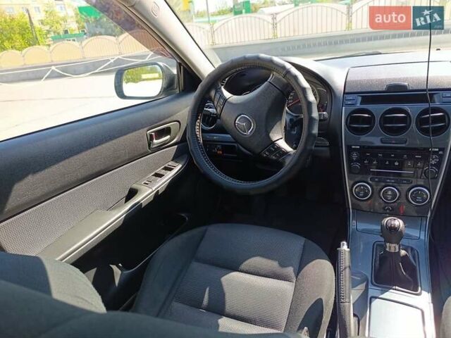 Синий Мазда 6, объемом двигателя 1.8 л и пробегом 170 тыс. км за 5150 $, фото 42 на Automoto.ua