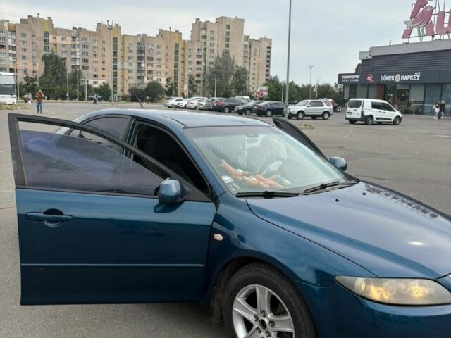 Синий Мазда 6, объемом двигателя 2 л и пробегом 300 тыс. км за 5300 $, фото 2 на Automoto.ua