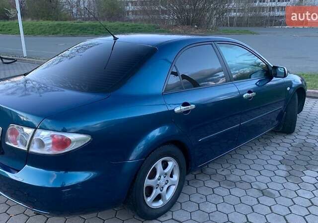 Синій Мазда 6, об'ємом двигуна 1.8 л та пробігом 258 тис. км за 4100 $, фото 5 на Automoto.ua