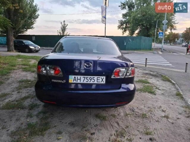 Синий Мазда 6, объемом двигателя 2 л и пробегом 205 тыс. км за 4500 $, фото 2 на Automoto.ua