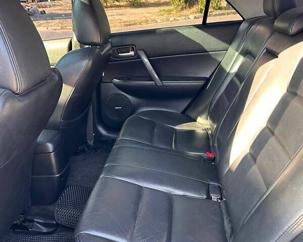 Синий Мазда 6, объемом двигателя 2 л и пробегом 300 тыс. км за 6600 $, фото 4 на Automoto.ua