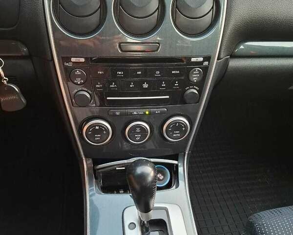 Синий Мазда 6, объемом двигателя 2 л и пробегом 205 тыс. км за 4500 $, фото 4 на Automoto.ua