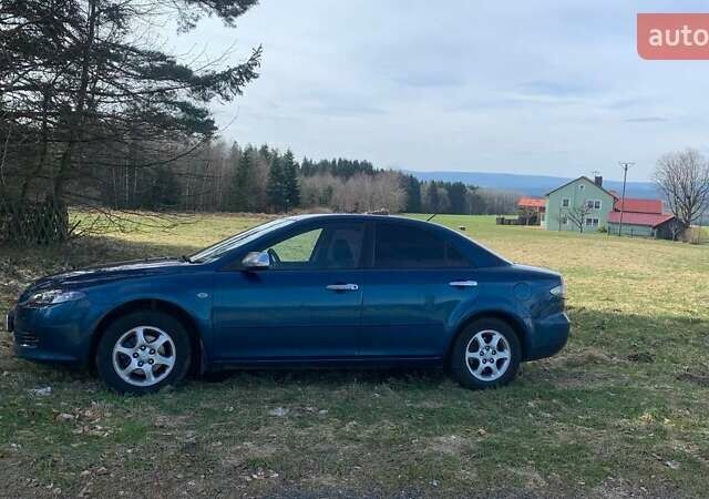 Синій Мазда 6, об'ємом двигуна 1.8 л та пробігом 258 тис. км за 4100 $, фото 8 на Automoto.ua