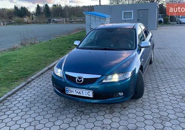 Синій Мазда 6, об'ємом двигуна 1.8 л та пробігом 258 тис. км за 4100 $, фото 3 на Automoto.ua