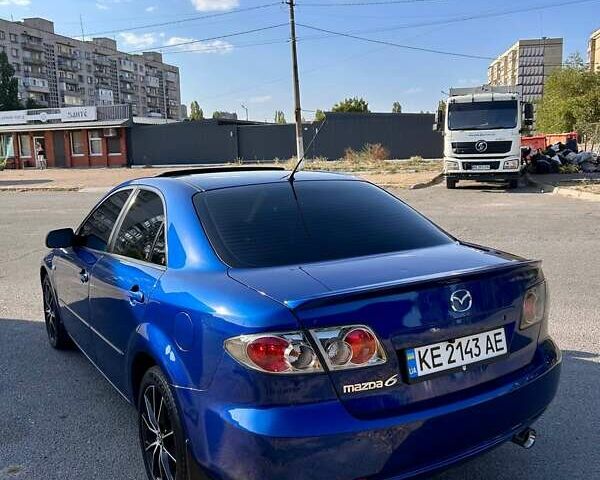 Синий Мазда 6, объемом двигателя 2 л и пробегом 300 тыс. км за 6600 $, фото 1 на Automoto.ua