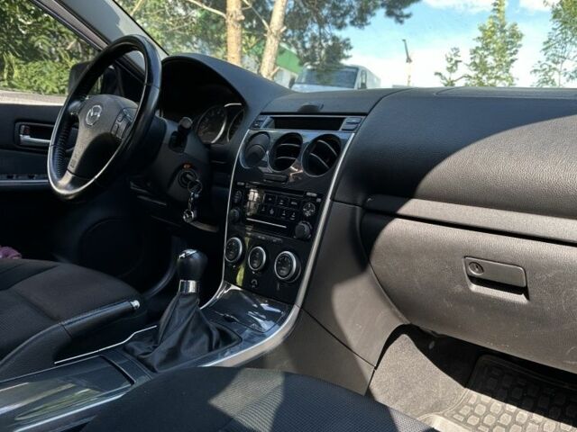 Синий Мазда 6, объемом двигателя 2 л и пробегом 188 тыс. км за 3900 $, фото 6 на Automoto.ua