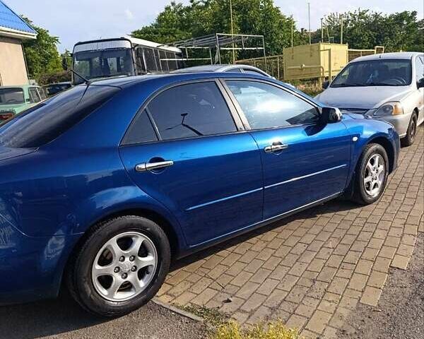 Синій Мазда 6, об'ємом двигуна 1.8 л та пробігом 258 тис. км за 4100 $, фото 7 на Automoto.ua