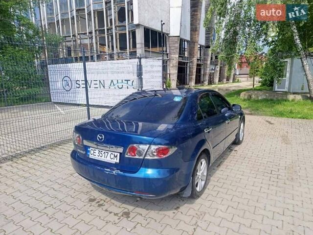 Синій Мазда 6, об'ємом двигуна 1.8 л та пробігом 244 тис. км за 4500 $, фото 4 на Automoto.ua