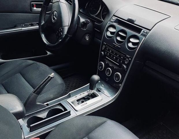Синий Мазда 6, объемом двигателя 2 л и пробегом 303 тыс. км за 2800 $, фото 6 на Automoto.ua