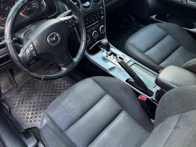 Синий Мазда 6, объемом двигателя 2 л и пробегом 303 тыс. км за 2800 $, фото 4 на Automoto.ua