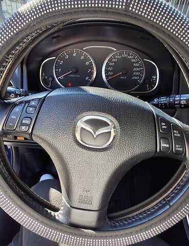 Синій Мазда 6, об'ємом двигуна 1.8 л та пробігом 248 тис. км за 4200 $, фото 5 на Automoto.ua