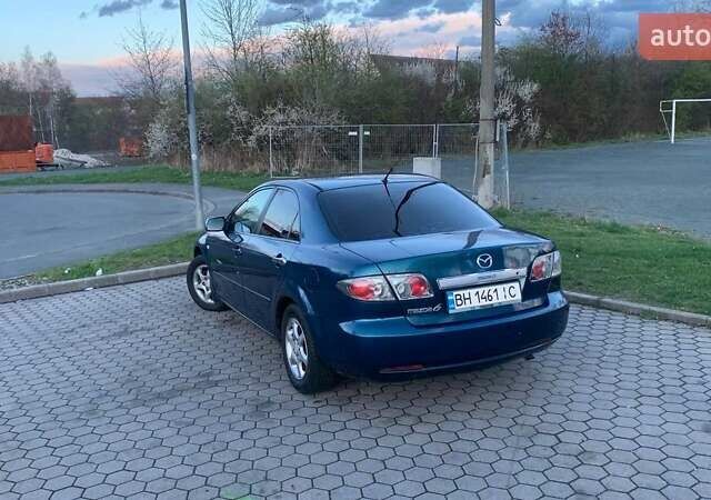 Синій Мазда 6, об'ємом двигуна 1.8 л та пробігом 258 тис. км за 4100 $, фото 2 на Automoto.ua
