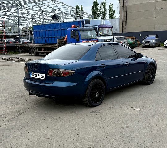 Синий Мазда 6, объемом двигателя 2 л и пробегом 185 тыс. км за 6000 $, фото 2 на Automoto.ua