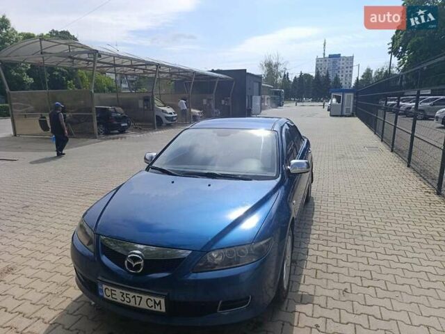 Синій Мазда 6, об'ємом двигуна 1.8 л та пробігом 244 тис. км за 4500 $, фото 2 на Automoto.ua