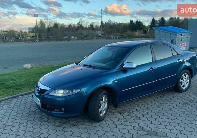 Синій Мазда 6, об'ємом двигуна 1.8 л та пробігом 258 тис. км за 4100 $, фото 1 на Automoto.ua