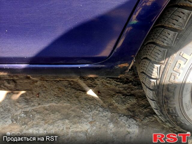 Синій Мазда 6, об'ємом двигуна 2 л та пробігом 245 тис. км за 4000 $, фото 1 на Automoto.ua