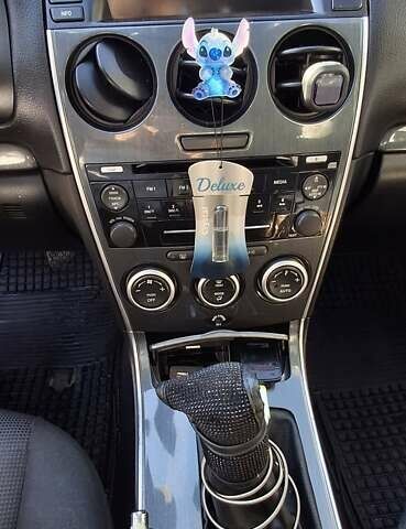 Синій Мазда 6, об'ємом двигуна 1.8 л та пробігом 248 тис. км за 4200 $, фото 4 на Automoto.ua